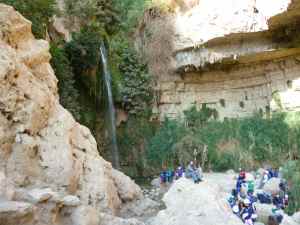 Doron seating in fron of Ein Gedi waterfall_