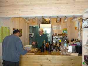Eiton Green and the Mashgiach at Tzuba Winery's Wine tasting bar-small