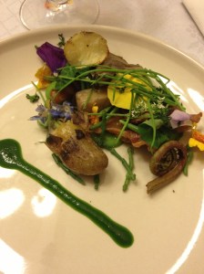 Surf and Turf Salad- Fried Chicken Skins, Sea Beans, Nasturtium, Pansies, petit onions, root greens, Romaine Puree, Spring Green Pea Gazpacho, Morels, Fiddlehead Ferns, Poached Baby Potatoes, Shaved Chorizo - close up